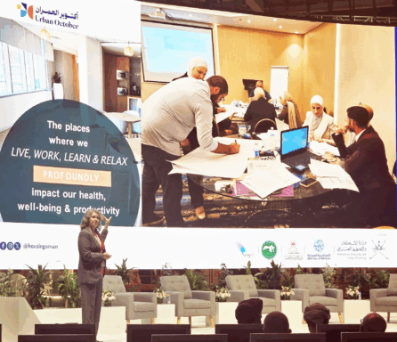 Professor Genell Ebini speaking at an event